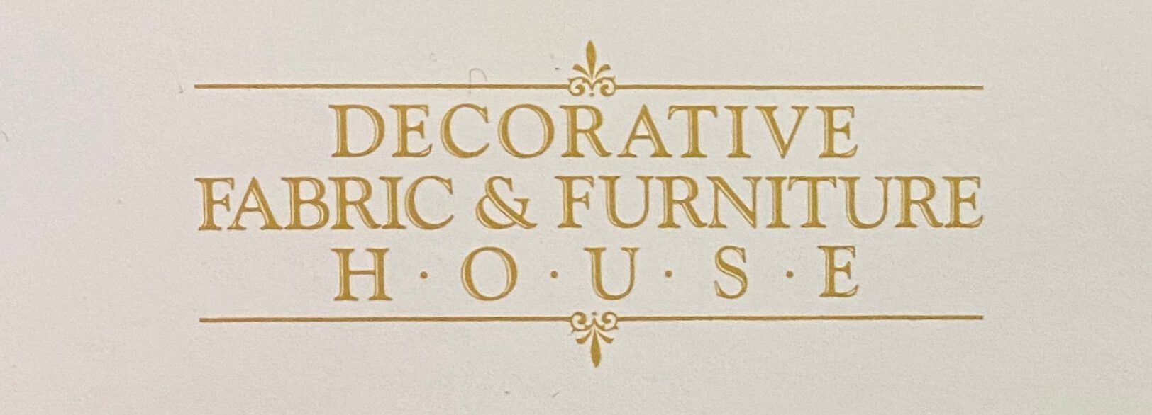 Gold Decorative Fabric & Furniture House emblem